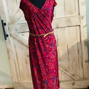 This is a midi fuchsia dress by Ralph Lauren size Large.